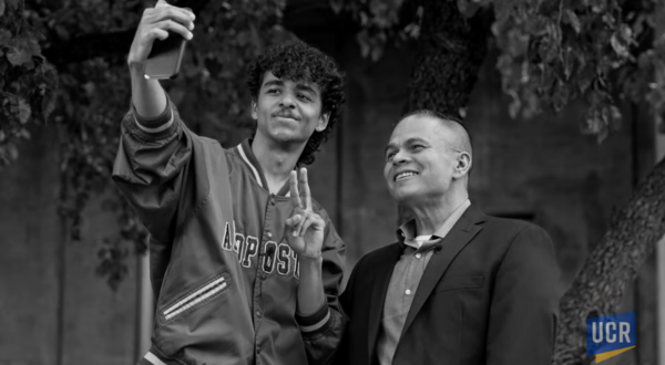 Michael Yosef Jimenez taking a selfie with Dr. Richard Rodriguez