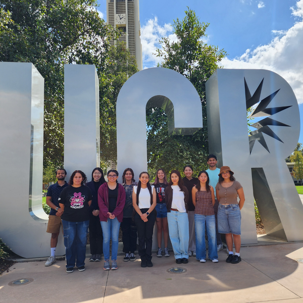 Honors Ambassadors posing in front of giant UCR metal letters